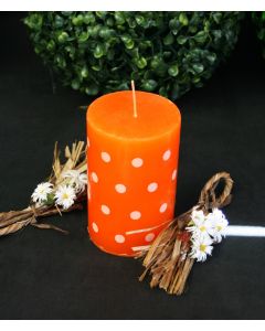 Bougie orange à pois blancs